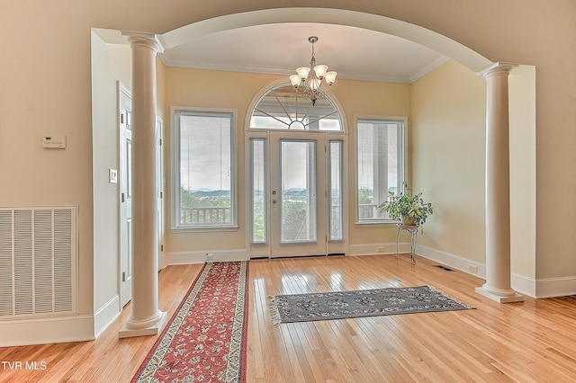 2304 Granite Dr, Johnson City, TN 37604 - foyer with wood-type flooring, arched walkways, decorative columns, visible vents, and ornamental molding