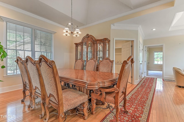 2304 Granite Dr, Johnson City, TN 37604 - dining room with an inviting chandelier, ornamental molding, baseboards, and light wood-type flooring