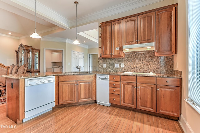 2304 Granite Dr, Johnson City, TN 37604 - kitchen featuring a sink, white appliances, a peninsula, light wood-type flooring, and under cabinet range hood