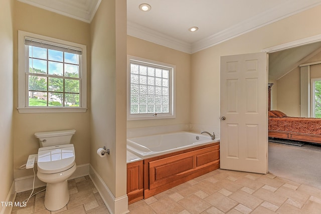 2304 Granite Dr, Johnson City, TN 37604 - bathroom featuring stone tile flooring, crown molding, a bath, and toilet