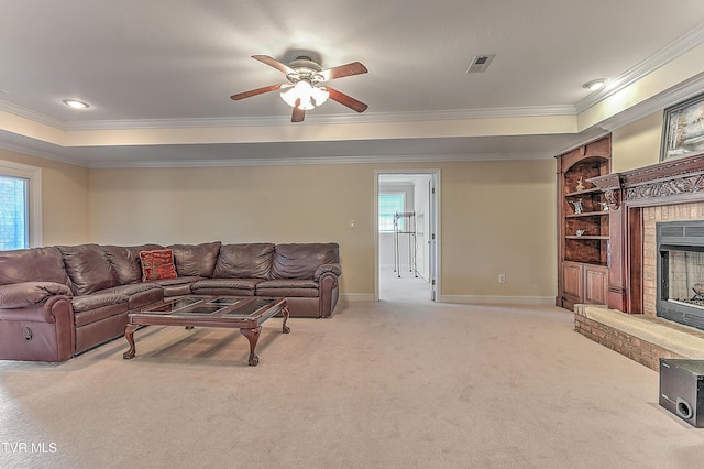 2304 Granite Dr, Johnson City, TN 37604 - living area with a brick fireplace, ceiling fan, light colored carpet, and ornamental molding