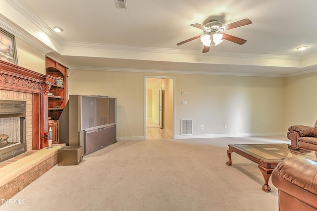 2304 Granite Dr, Johnson City, TN 37604 - unfurnished living room with a tray ceiling, visible vents, ornamental molding, and a fireplace