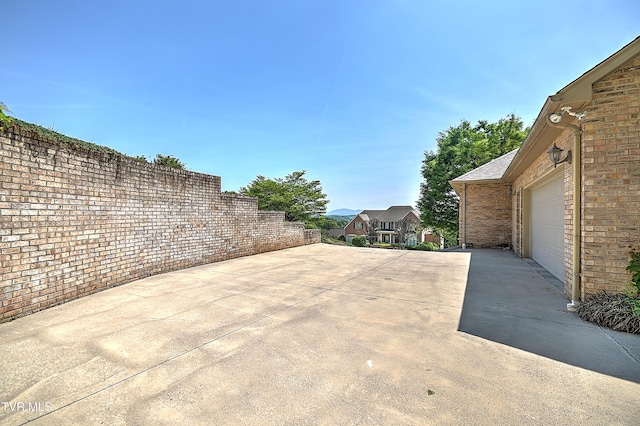 2304 Granite Dr, Johnson City, TN 37604 - view of patio with a garage and concrete driveway