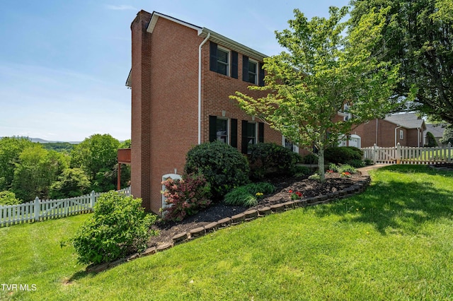436 Headtown Rd, Jonesborough, TN 37659 - view of side of property featuring fence, a lawn, and brick siding