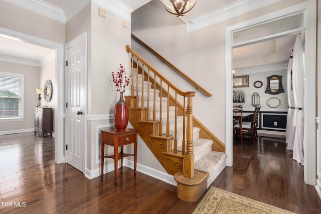 436 Headtown Rd, Jonesborough, TN 37659 - staircase with wood-type flooring, ornamental molding, baseboards, and a notable chandelier