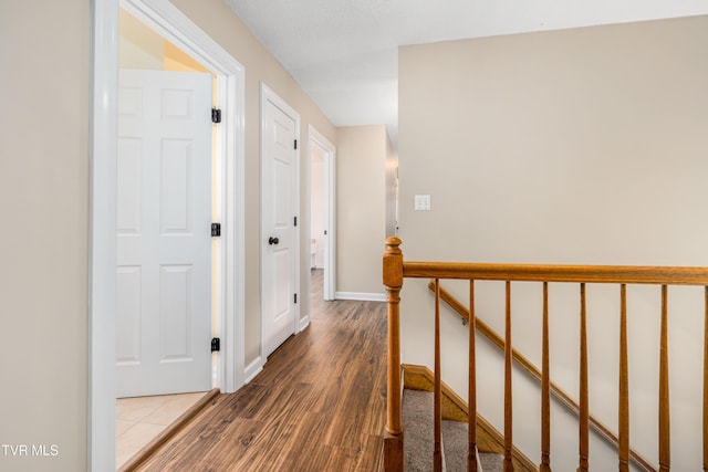 436 Headtown Rd, Jonesborough, TN 37659 - corridor with baseboards, wood finished floors, and an upstairs landing