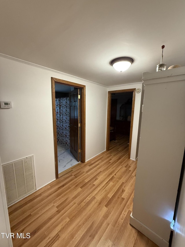 125 Babb Rd, Elizabethton, TN 37643 - hall with visible vents, crown molding, and light wood-type flooring