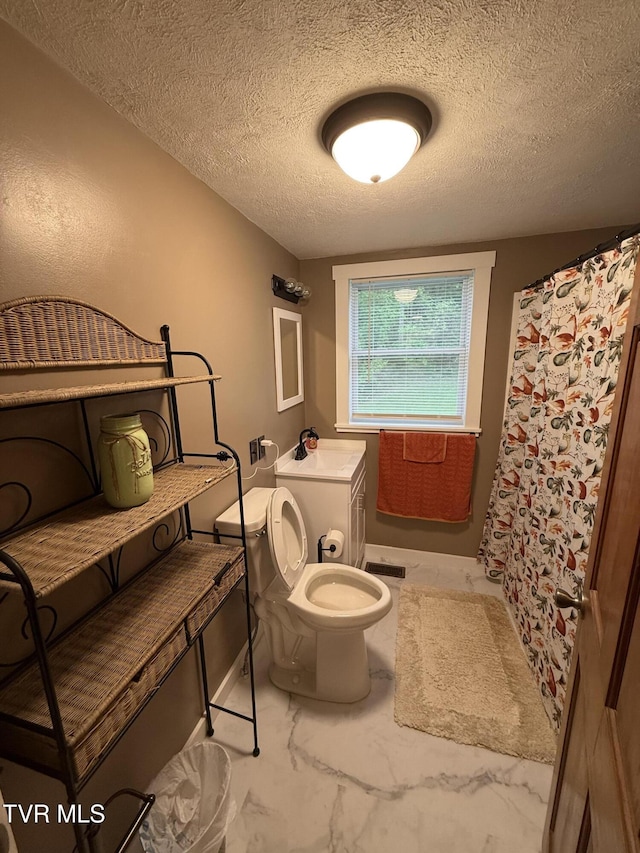 125 Babb Rd, Elizabethton, TN 37643 - bathroom with toilet, a textured ceiling, a shower with shower curtain, and marble finish floor