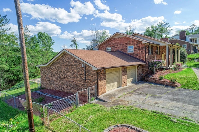 2653 Suffolk St, Kingsport, TN 37660 - view of front facade with brick siding, driveway, a garage, and roof with shingles
