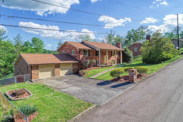 2653 Suffolk St, Kingsport, TN 37660 - view of front of property featuring brick siding, a garage, and a chimney
