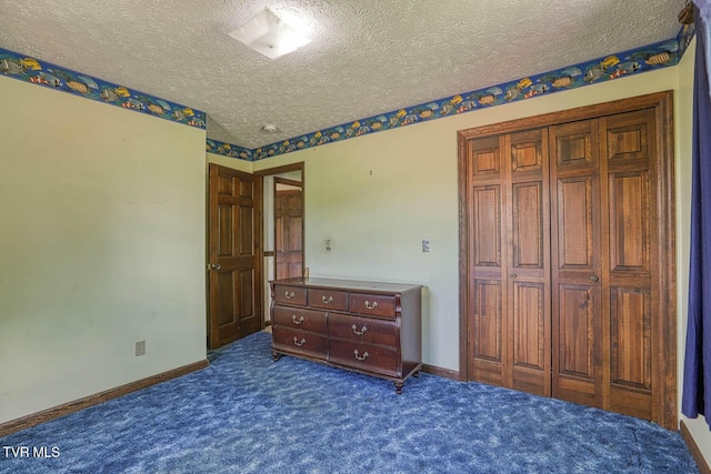 2653 Suffolk St, Kingsport, TN 37660 - carpeted bedroom featuring a textured ceiling, baseboards, and a closet