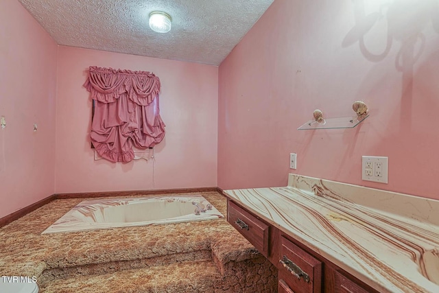 2653 Suffolk St, Kingsport, TN 37660 - bathroom with a textured ceiling and a garden tub