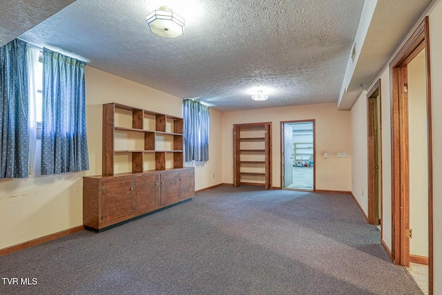 2653 Suffolk St, Kingsport, TN 37660 - carpeted spare room featuring a textured ceiling and baseboards
