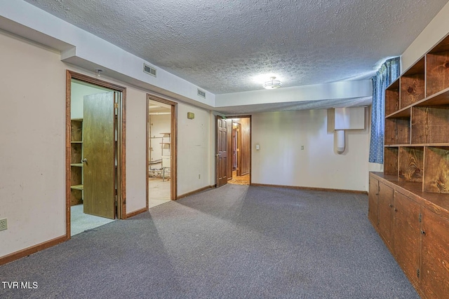 2653 Suffolk St, Kingsport, TN 37660 - carpeted spare room with a textured ceiling and baseboards