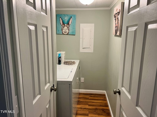 1220 2nd Ave, Big Stone Gap, VA 24219 - clothes washing area with laundry area, crown molding, wood finished floors, washer and dryer, and electric panel