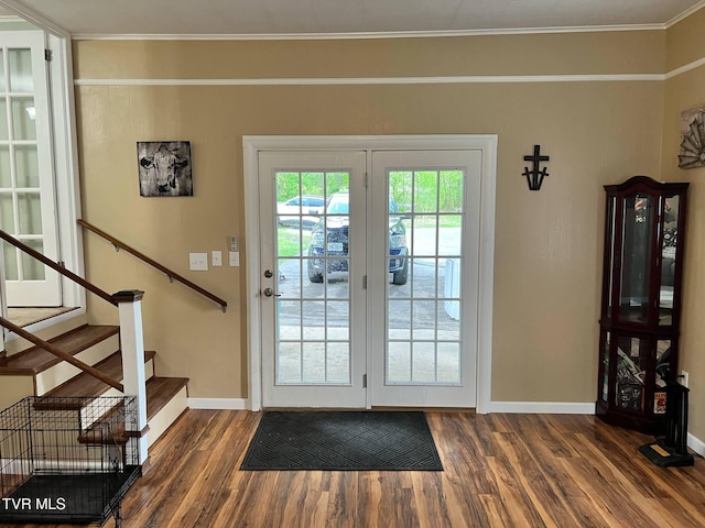 1220 2nd Ave, Big Stone Gap, VA 24219 - entryway with baseboards, dark wood-style flooring, crown molding, and stairs