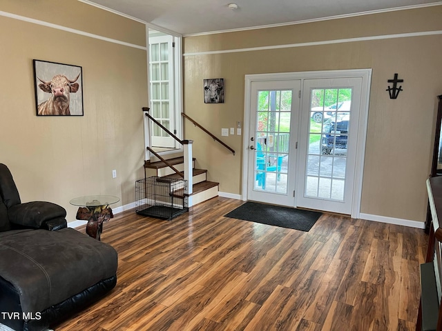 1220 2nd Ave, Big Stone Gap, VA 24219 - doorway with crown molding, baseboards, stairs, and wood finished floors