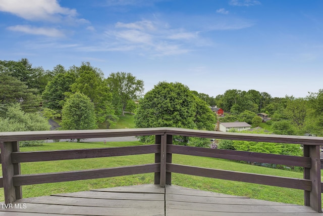 deck featuring a yard