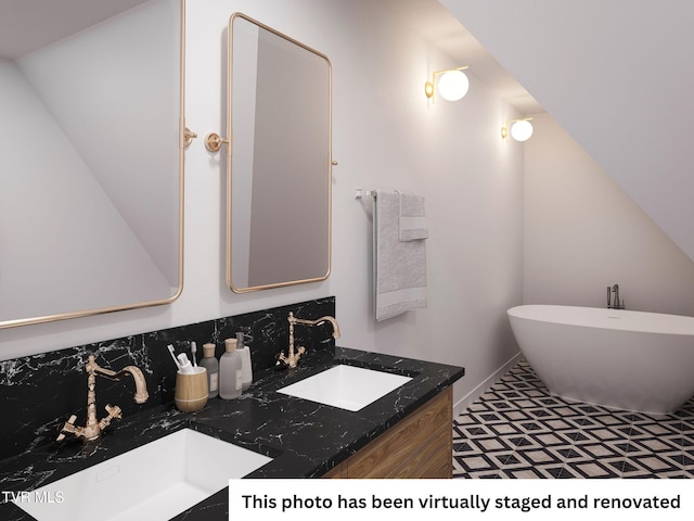 full bathroom with double vanity and a soaking tub