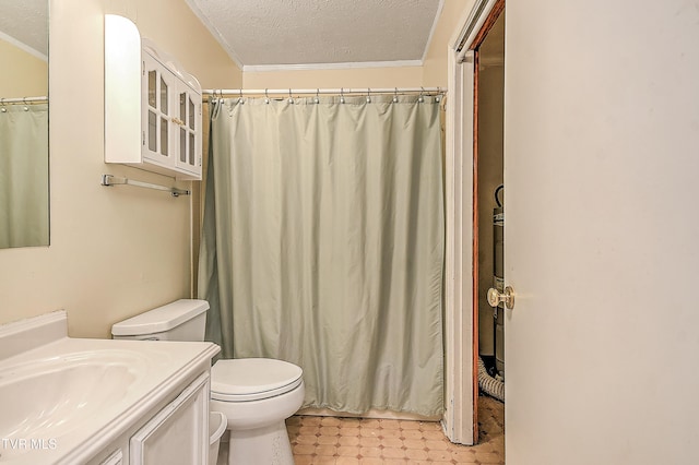 full bath with crown molding, vanity, toilet, and a textured ceiling
