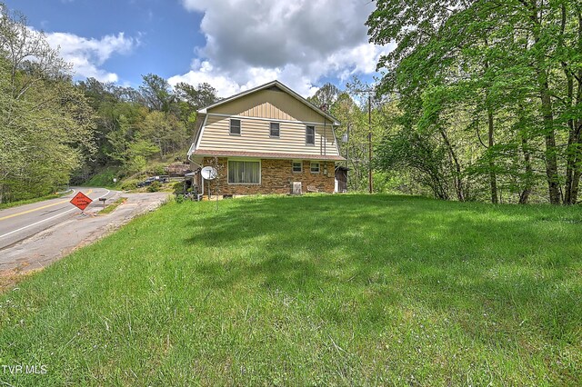 3851 Helen Henderson Hwy, Davenport, VA 24239 - back of house with a lawn and stone siding