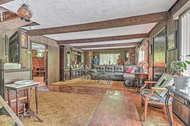 3851 Helen Henderson Hwy, Davenport, VA 24239 - living room featuring a textured ceiling and beam ceiling