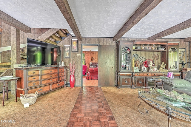 3851 Helen Henderson Hwy, Davenport, VA 24239 - living area with a textured ceiling, beam ceiling, and wooden walls