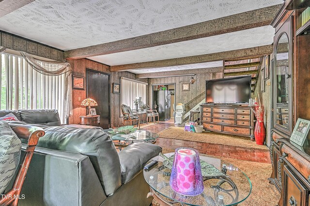 3851 Helen Henderson Hwy, Davenport, VA 24239 - living room with wood walls, a textured ceiling, and beam ceiling