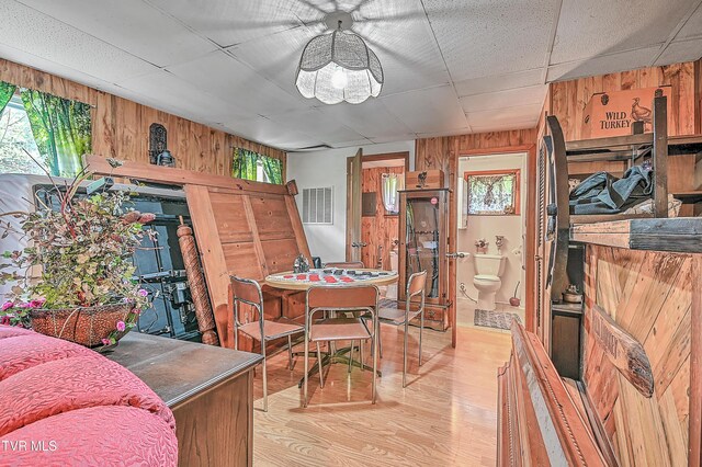 3851 Helen Henderson Hwy, Davenport, VA 24239 - dining area featuring wooden walls, visible vents, a healthy amount of sunlight, and wood finished floors