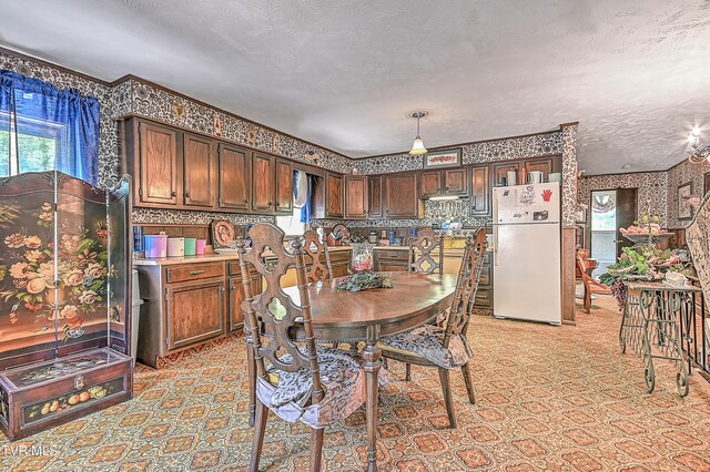 3851 Helen Henderson Hwy, Davenport, VA 24239 - dining area with a textured ceiling, a healthy amount of sunlight, and wallpapered walls