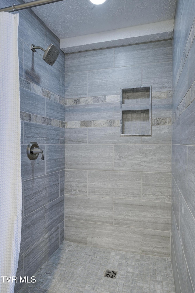 200 E Main St Unit 201, Johnson City, TN 37604 - bathroom featuring a tile shower