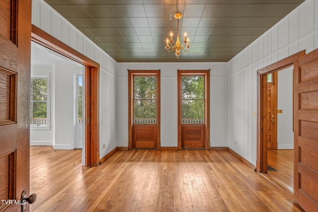 243 NW Mason Pl, Abingdon, VA 24210 - entrance foyer featuring an inviting chandelier, light wood finished floors, and baseboards
