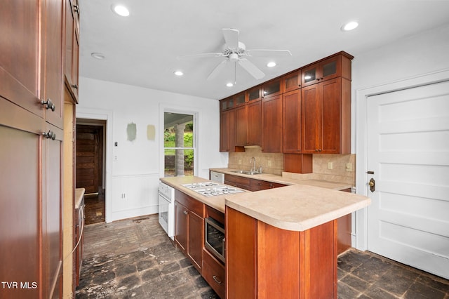 243 NW Mason Pl, Abingdon, VA 24210 - kitchen featuring ceiling fan, light countertops, recessed lighting, stainless steel microwave, and tasteful backsplash
