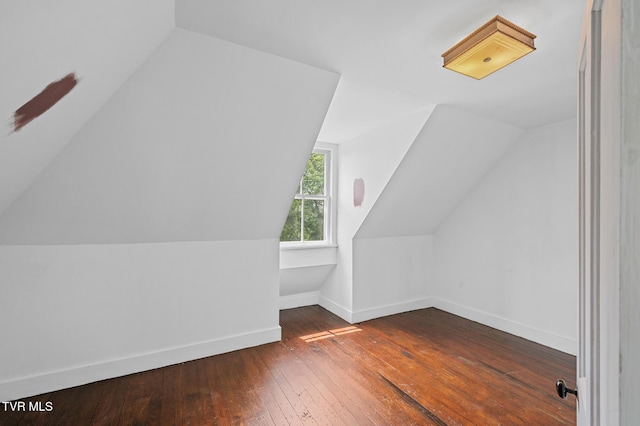 243 NW Mason Pl, Abingdon, VA 24210 - bonus room with baseboards, vaulted ceiling, and dark wood-style flooring