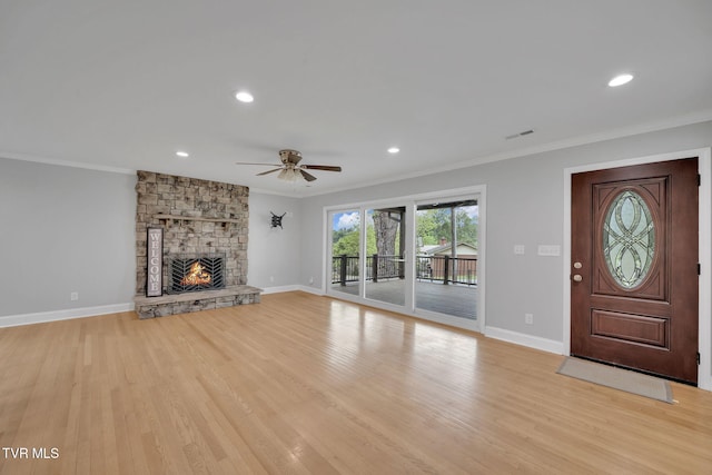 3749 Hemlock Park Cir, Kingsport, TN 37663 - unfurnished living room featuring crown molding, ceiling fan, visible vents, and light wood-type flooring