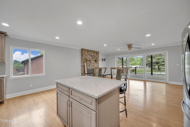 3749 Hemlock Park Cir, Kingsport, TN 37663 - kitchen with baseboards, ornamental molding, and a kitchen bar