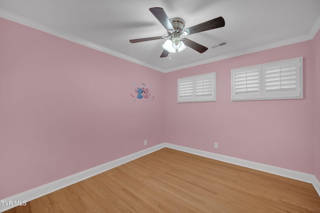 3749 Hemlock Park Cir, Kingsport, TN 37663 - empty room featuring crown molding, a ceiling fan, baseboards, and light wood-style flooring