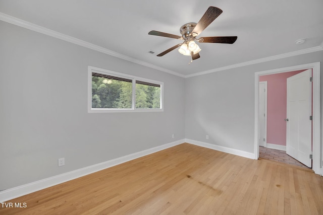 3749 Hemlock Park Cir, Kingsport, TN 37663 - unfurnished room with baseboards, ceiling fan, ornamental molding, and light wood-style flooring