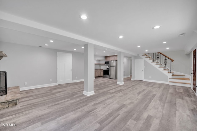 3749 Hemlock Park Cir, Kingsport, TN 37663 - unfurnished living room with visible vents, light wood-type flooring, stairway, baseboards, and recessed lighting