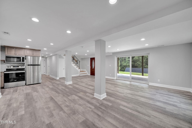 3749 Hemlock Park Cir, Kingsport, TN 37663 - unfurnished living room with light wood-style floors, baseboards, visible vents, and stairway