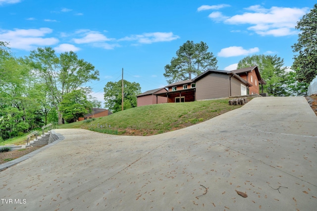 3749 Hemlock Park Cir, Kingsport, TN 37663 - view of side of home with a yard and driveway