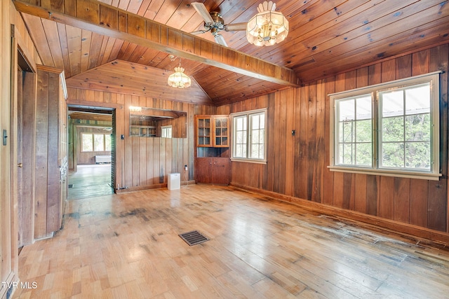 357 Webb Rd, Piney Flats, TN 37686 - spare room featuring wood-type flooring, vaulted ceiling with beams, visible vents, and a healthy amount of sunlight