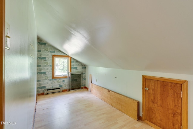 357 Webb Rd, Piney Flats, TN 37686 - bonus room featuring a fireplace, vaulted ceiling, wood finished floors, and a baseboard radiator