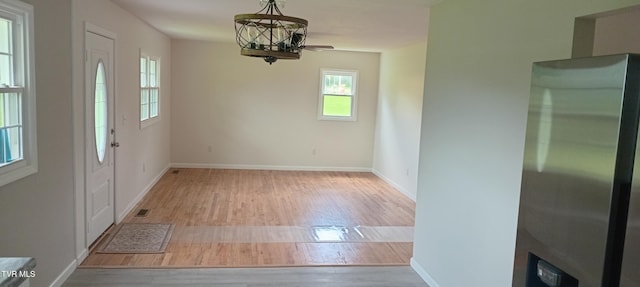 2160 Whirlwind Rd, Greeneville, TN 37743 - unfurnished dining area featuring wood finished floors and baseboards