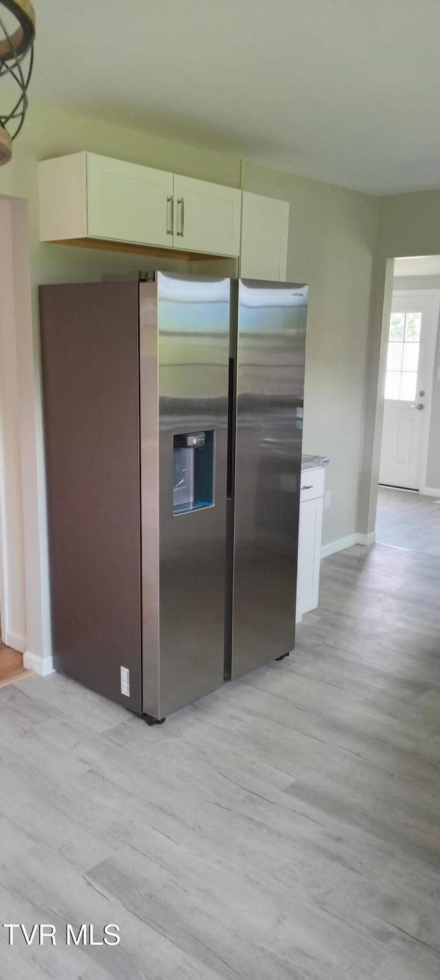 2160 Whirlwind Rd, Greeneville, TN 37743 - kitchen featuring white cabinetry, light wood finished floors, and stainless steel refrigerator with ice dispenser