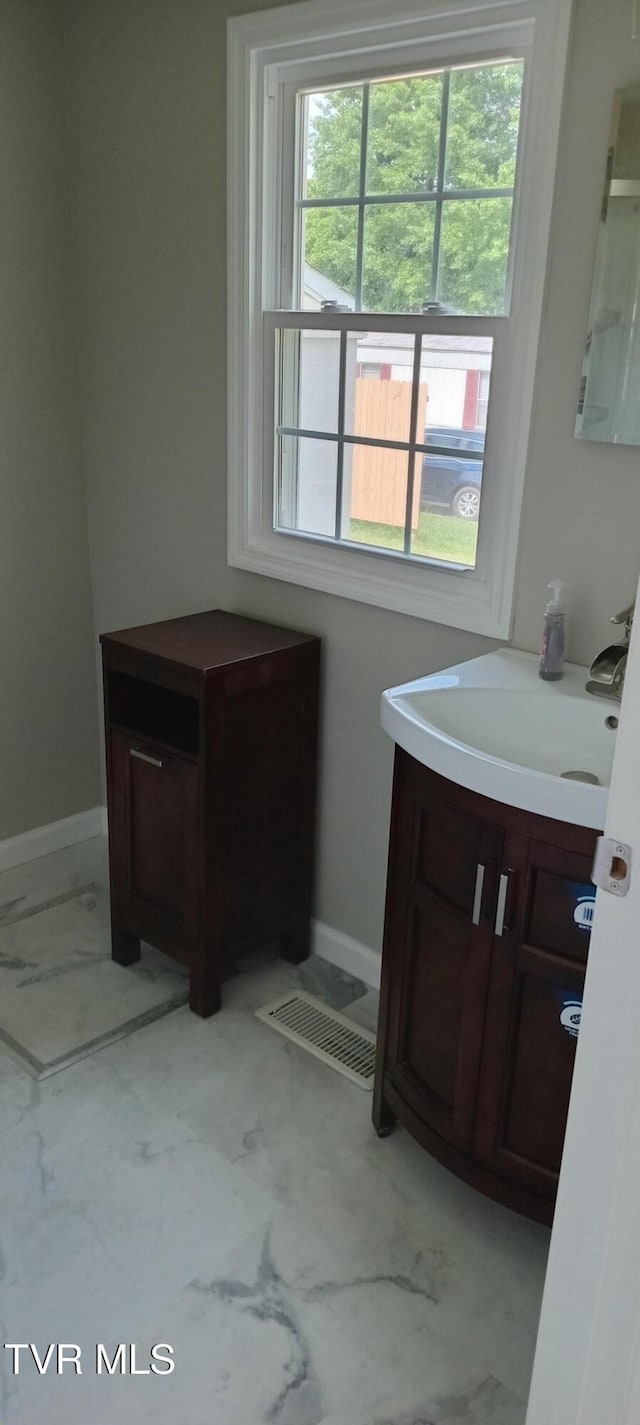 2160 Whirlwind Rd, Greeneville, TN 37743 - bathroom with marble finish floor, vanity, visible vents, and a wealth of natural light