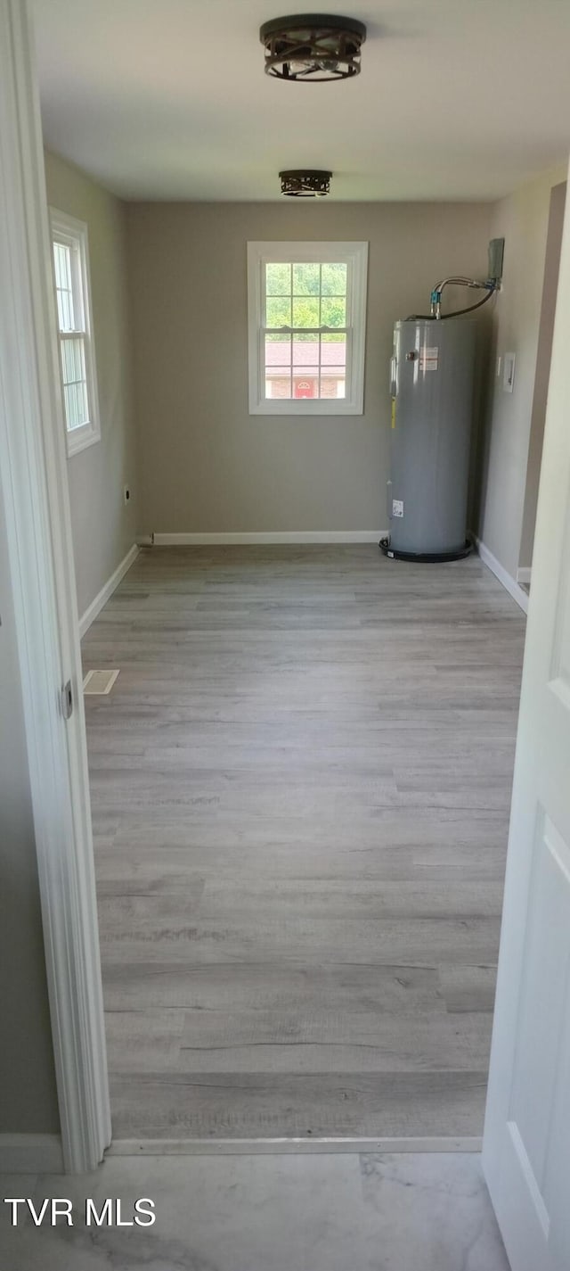 2160 Whirlwind Rd, Greeneville, TN 37743 - interior space with wood finished floors, baseboards, and gas water heater