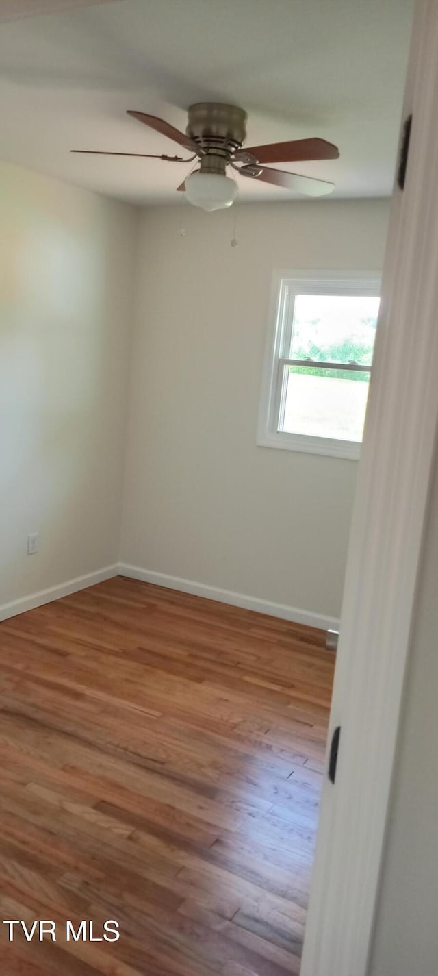 2160 Whirlwind Rd, Greeneville, TN 37743 - empty room with baseboards, wood finished floors, and a ceiling fan