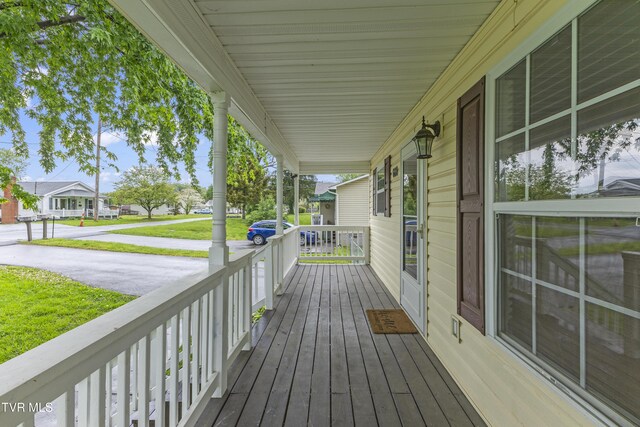 608 Walnut St, Elizabethton, TN 37643 - deck featuring a porch and a residential view