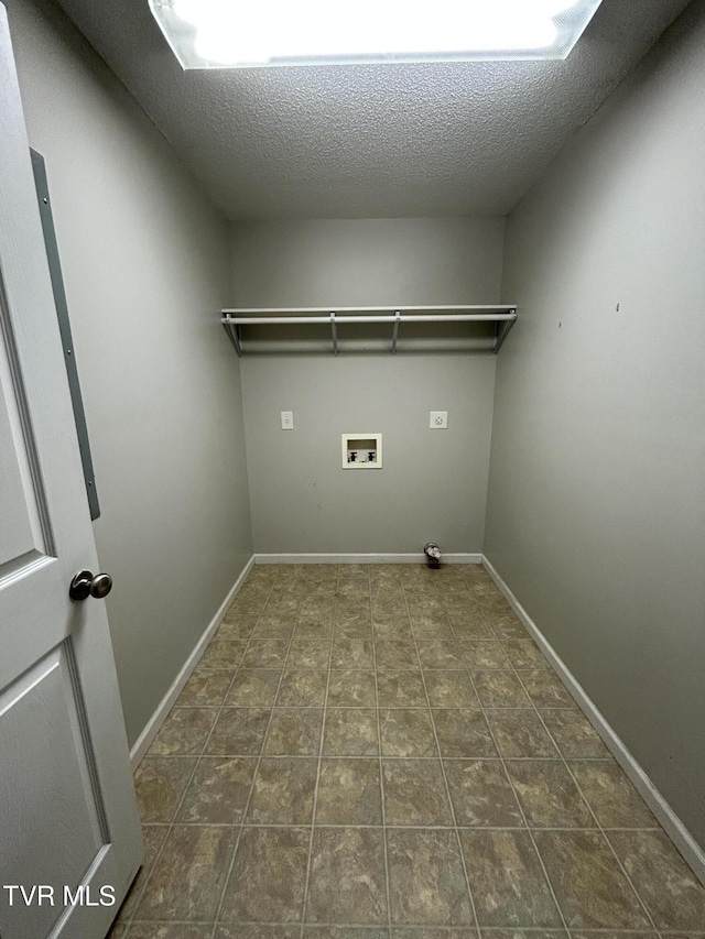 608 Walnut St, Elizabethton, TN 37643 - washroom featuring washer hookup, a textured ceiling, and baseboards